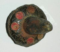 Ironage possible Sheild Stud with Red glass inlays found at Pitchbury Hill Fort